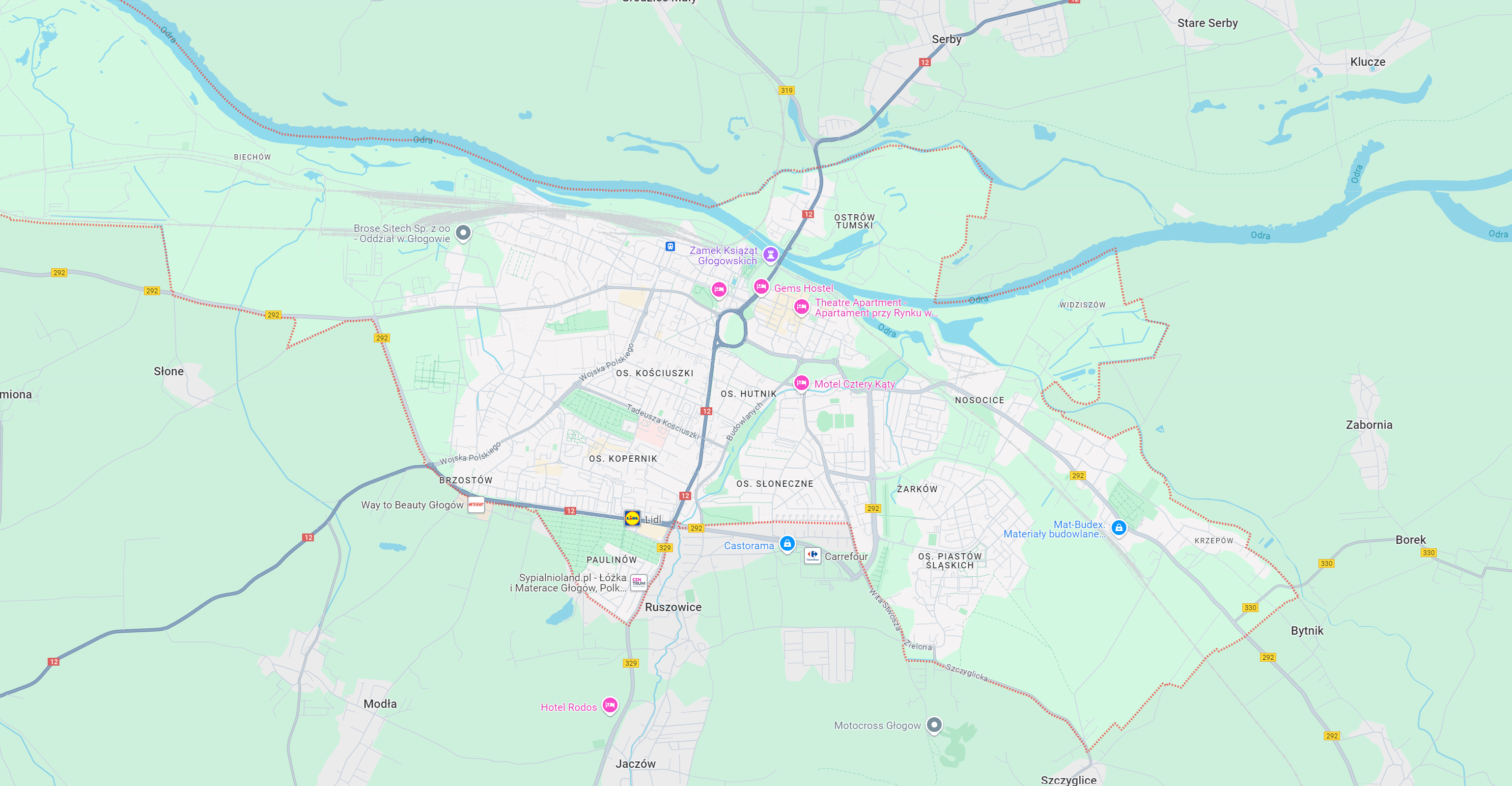 Mapa przedstawiająca obszar Głogowa i okolic, z oznaczeniem dróg, miejscowości oraz punktów orientacyjnych. Obszar zielony z siecią dróg oraz rzeką Odrą w tle. Idealna dla osób szukających informacji o regionie, w tym lokalizacji myjni bezdotykowych.